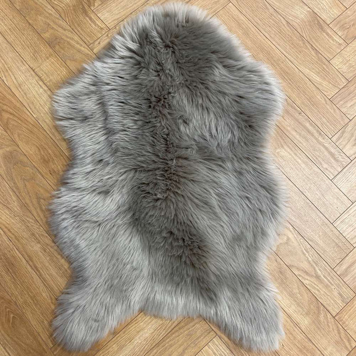 Irresistibly tactile faux sheepskin snug grey rug