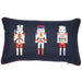 Embroidery toy soldiers on a navy cushion with red edging