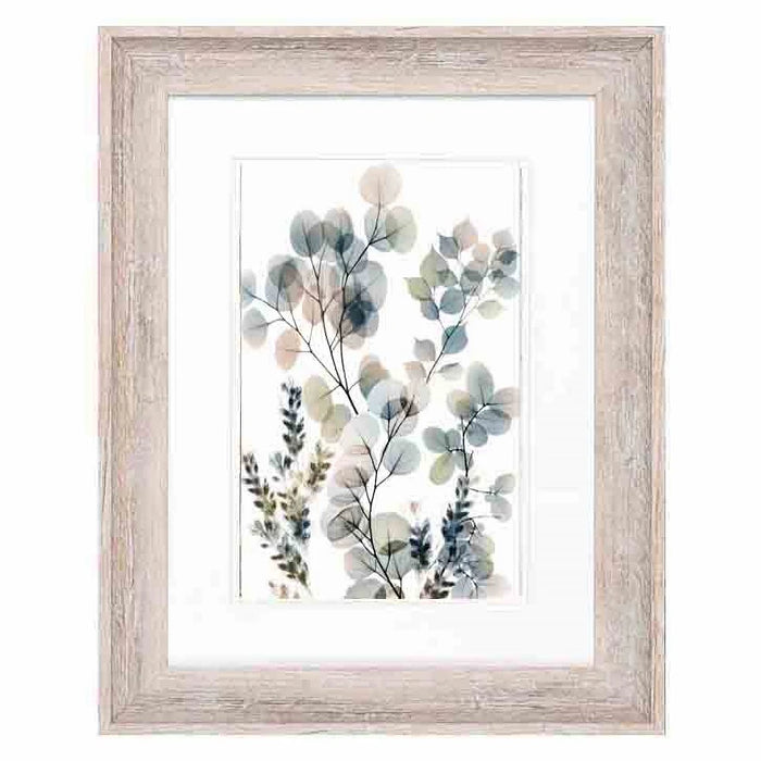 A green, blue and pink foliage print in an antique white frame