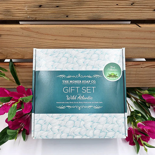 The simple yet beautiful Wild Atlantic gift box, filled with a Garden Mint & Eucalyptus soap, Mint body moisturiser, Poppy Seed body scrub and a jar of Calm Oats & Chamomile bath salts