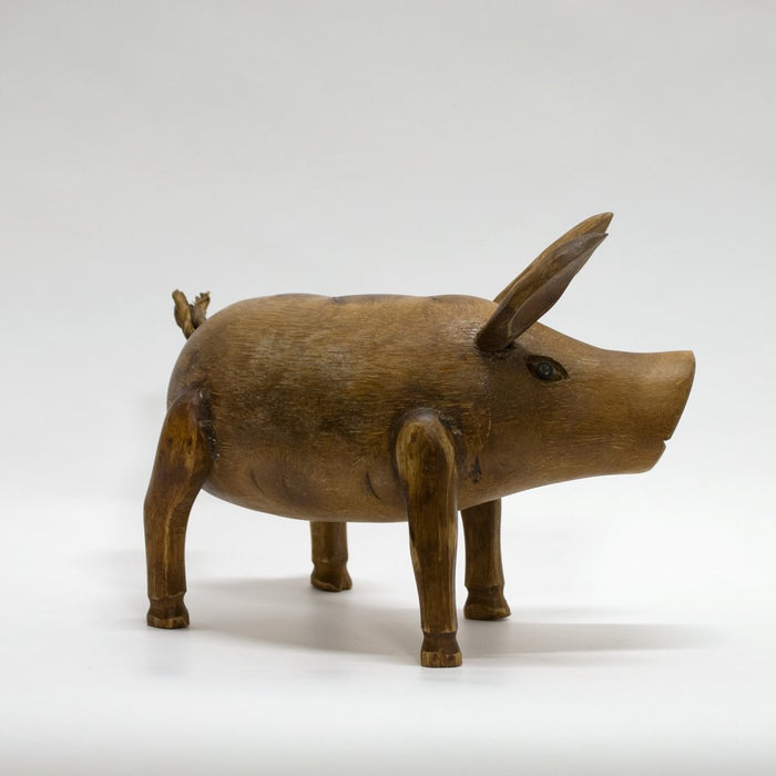 Wooden pig figurine