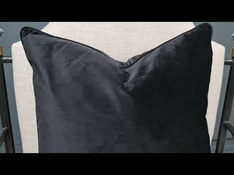Luxe feather large black velvet square cushion with piped-edge detailing