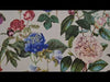 Bold flower pattern wallpaper on a subtle pink background